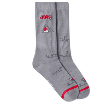 Gray socks with 'JAWS' logo and shark design on a white background